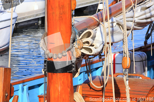 Image of details of an old fishing boat sailing out of wood