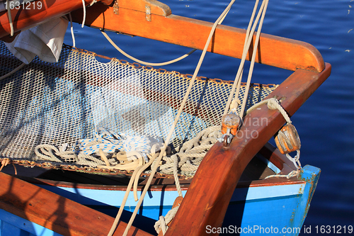 Image of details of an old fishing boat sailing out of wood