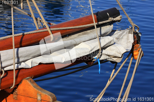 Image of details of an old fishing boat sailing out of wood