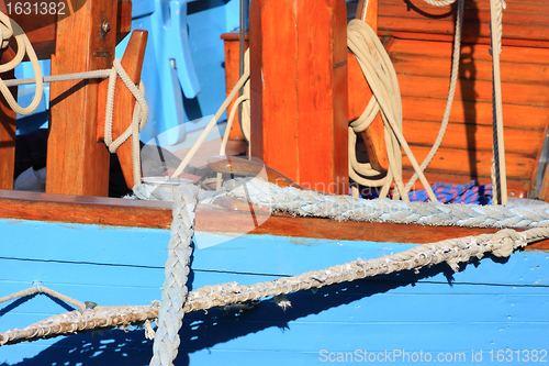 Image of details of an old fishing boat sailing out of wood