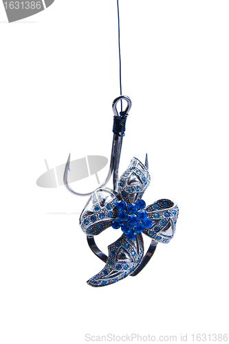 Image of jewelry hanging on fishing hook