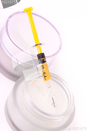 Image of botox cream with syringe