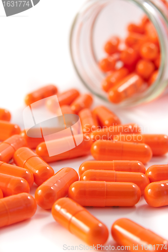 Image of bunch of orange pills