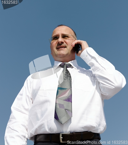 Image of businessman calling