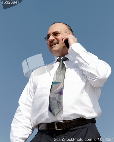 Image of businessman calling