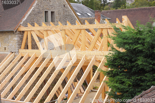 Image of construction of the wooden frame of a roof