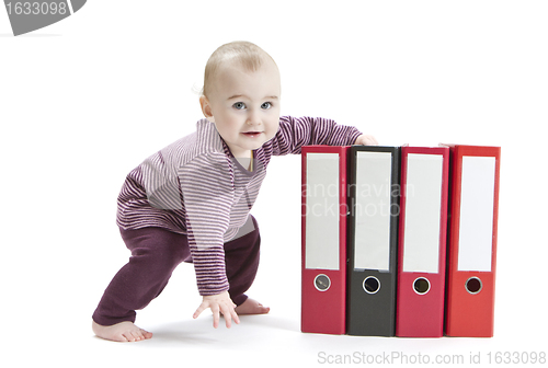 Image of young child with ring file