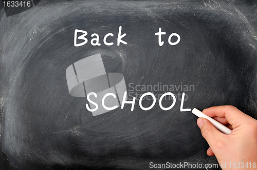 Image of Back to school written on a blackboard