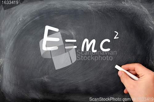 Image of Relativity formula written on a  Blackboard background