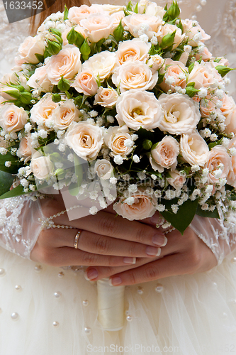 Image of Bride holding wedding bouquet