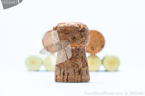 Image of cork and pyramid made of bottle corks