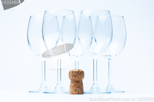 Image of glass wine stand symmetrically with cork