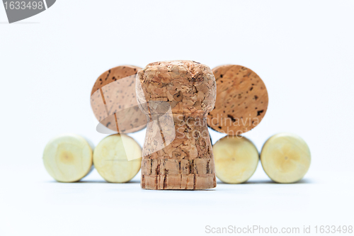 Image of cork and pyramid made of bottle corks