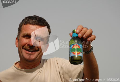Image of man and beer