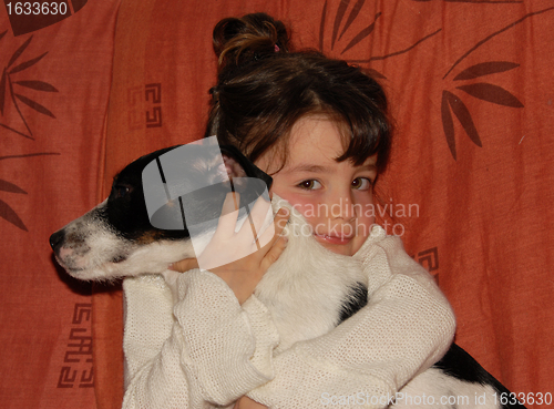 Image of little girl and dog