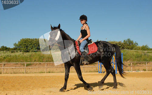 Image of horse and woman in dressage