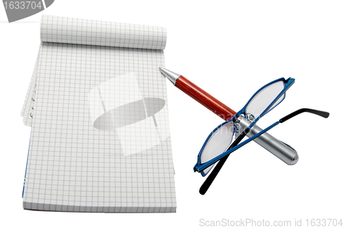 Image of pen pad and glasses