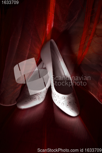 Image of Bridal shoes on the floor