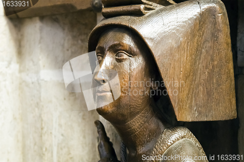 Image of wooden female face