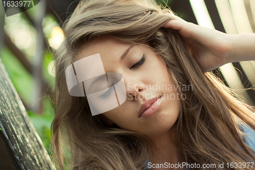 Image of Girl with eyes closed