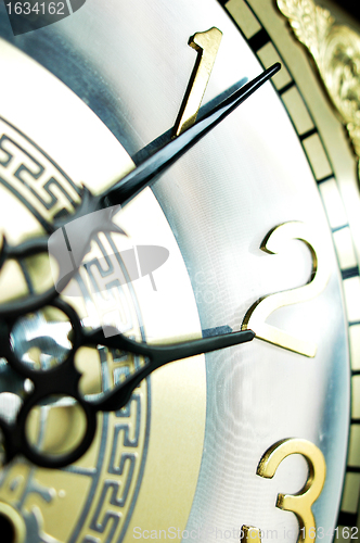 Image of Clock hands, shallow DOF