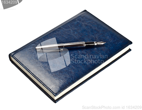 Image of pen on closed diary