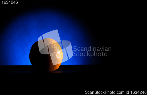 Image of crescent orange in blue light