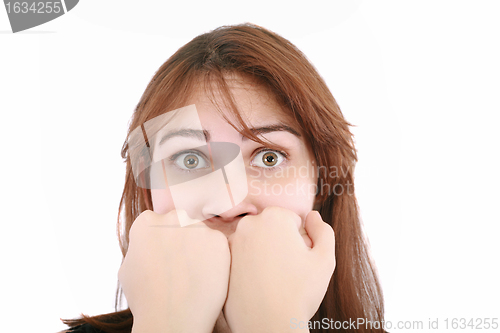 Image of scared woman screaming with hands on the mouth isolated on white