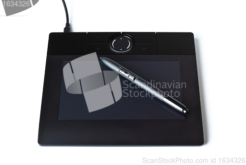Image of black drawing tablet with pen
