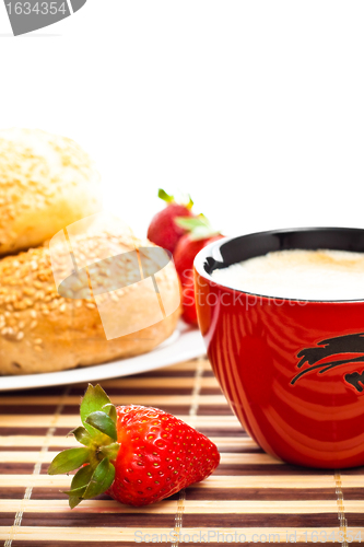 Image of coffee, buns and strawberries