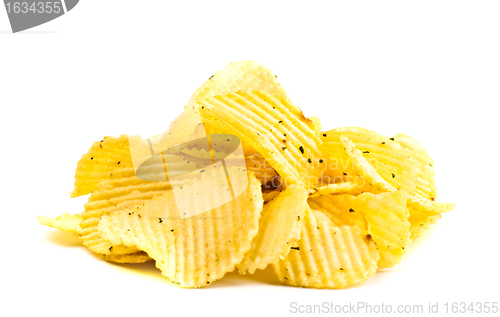 Image of handful of yellow potato chips