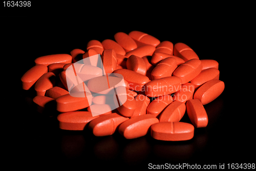 Image of batch of red pills