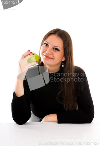 Image of smiling young woman with apple