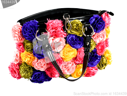 Image of female bag with artificial flowers