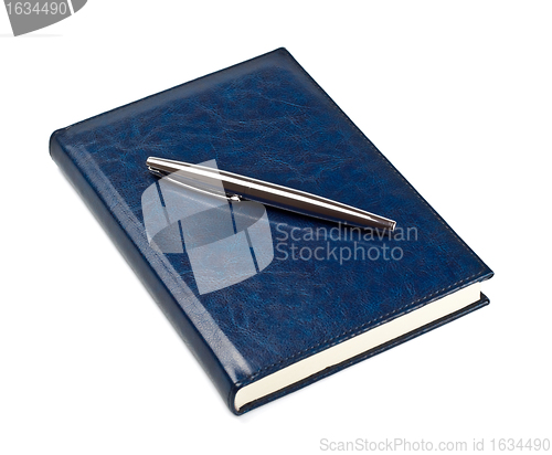 Image of pen on closed diary