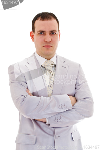 Image of attractive young man in wedding suit