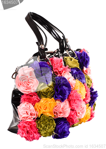 Image of female bag with artificial flowers