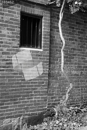 Image of Old Prison Wall with bars in window