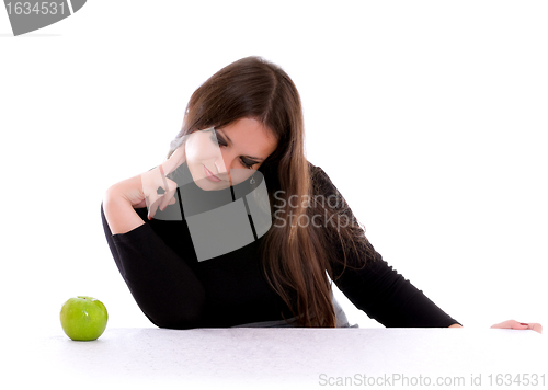 Image of girl staring at the apple