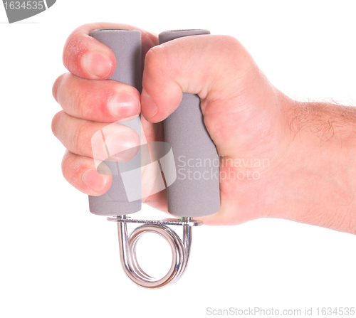 Image of hand with spring trainer