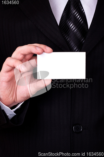 Image of businessman show blank card