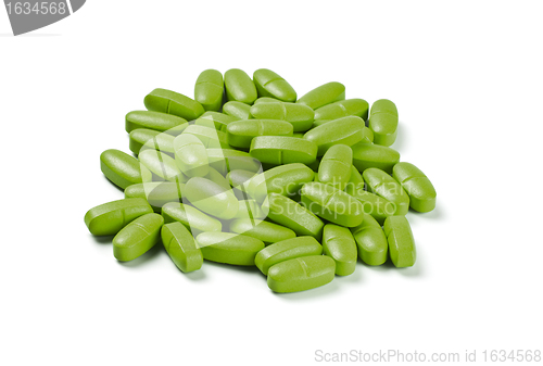 Image of batch of green pills