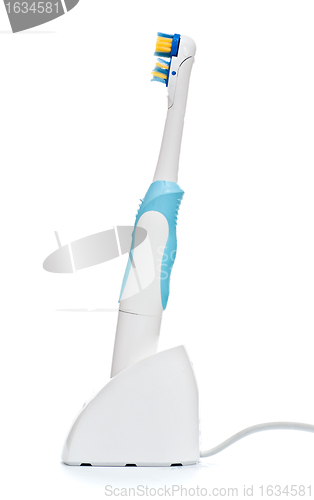 Image of electric toothbrush on stand