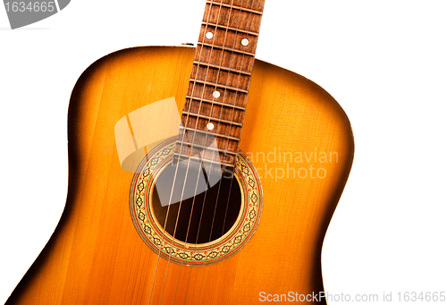 Image of acoustic guitar central part closeup