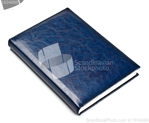 Image of closed blue leather notebook