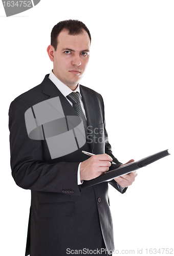 Image of businessman with pen and notepad