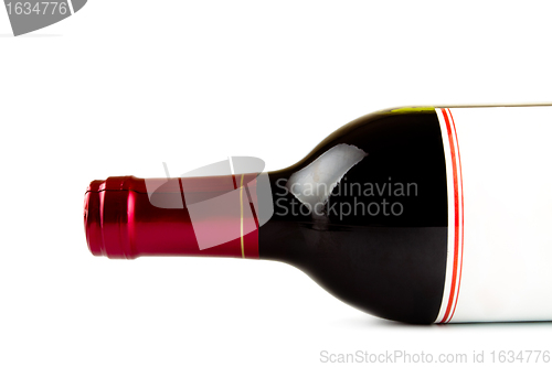 Image of laying bottle of red wine closeup