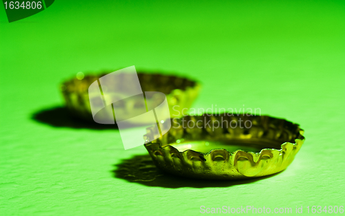 Image of two beer caps