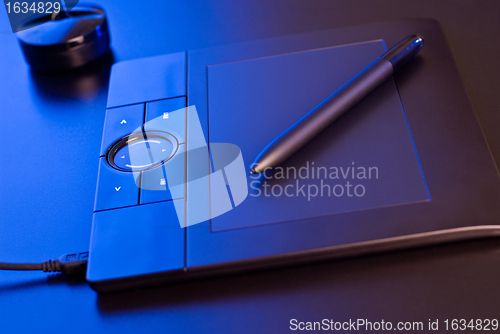 Image of drawing tablet in blue light
