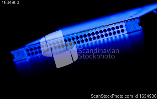 Image of pin socket closeup in blue light